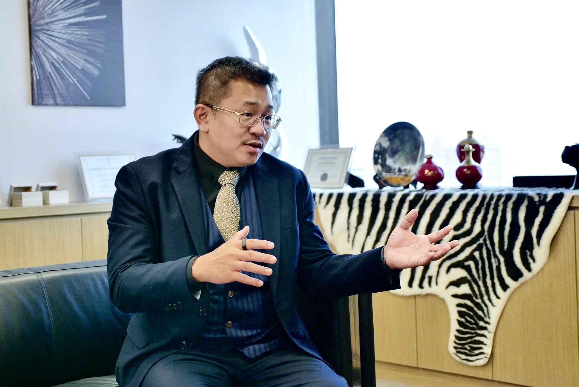 天時國際家族辦公室合夥人劉毅明（Canby Liu）分享 Trinity Model 的整合治理核心。